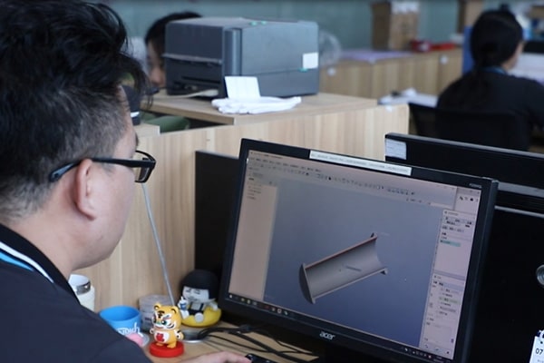 Engineer working on 3D modeling for silicone product design, showcasing in-house tooling capability and customized development service.