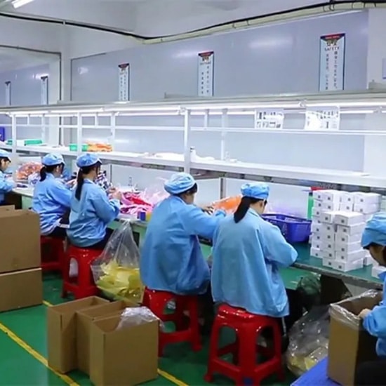 Haotian Silicone factory workers assembling and packaging custom silicone products for OEM and retail orders