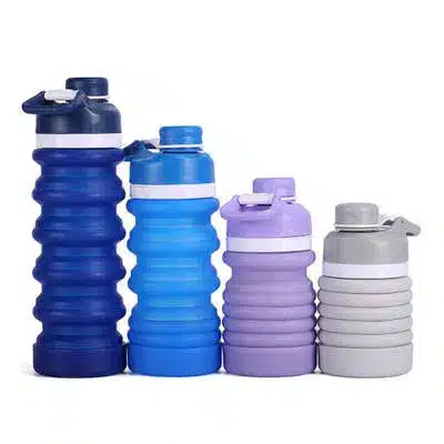 Blue and gray foldable silicone bottles manufactured in a Chinese factory for OEM clients worldwide.
