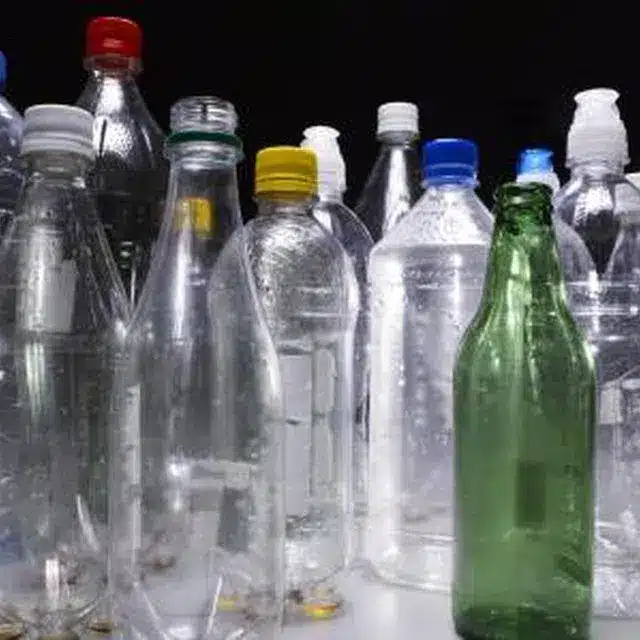 Various plastic bottles showing the diversity of materials and recycling challenges for brands.